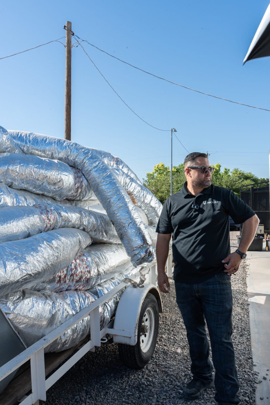 Rolls of insulated duct loaded on a trailer